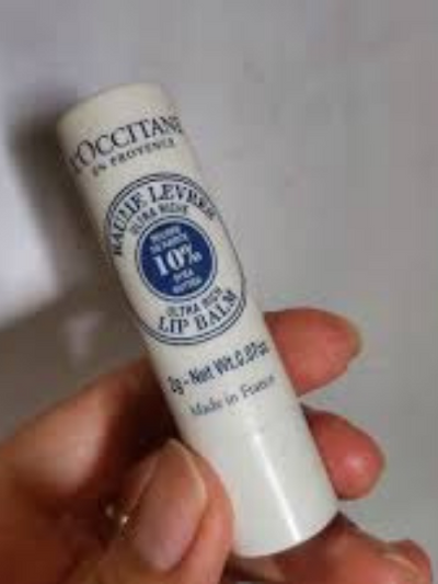 L'Occitane en Provence Shea butter lip balm stick for sale at Robert Simmonds Clothing in Fredericton, New Brunswick.